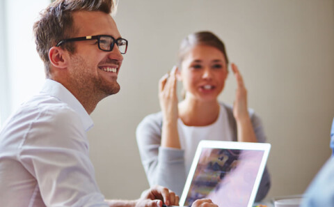 health and safety business partner subscriptions image of a man on a laptop in a meeting