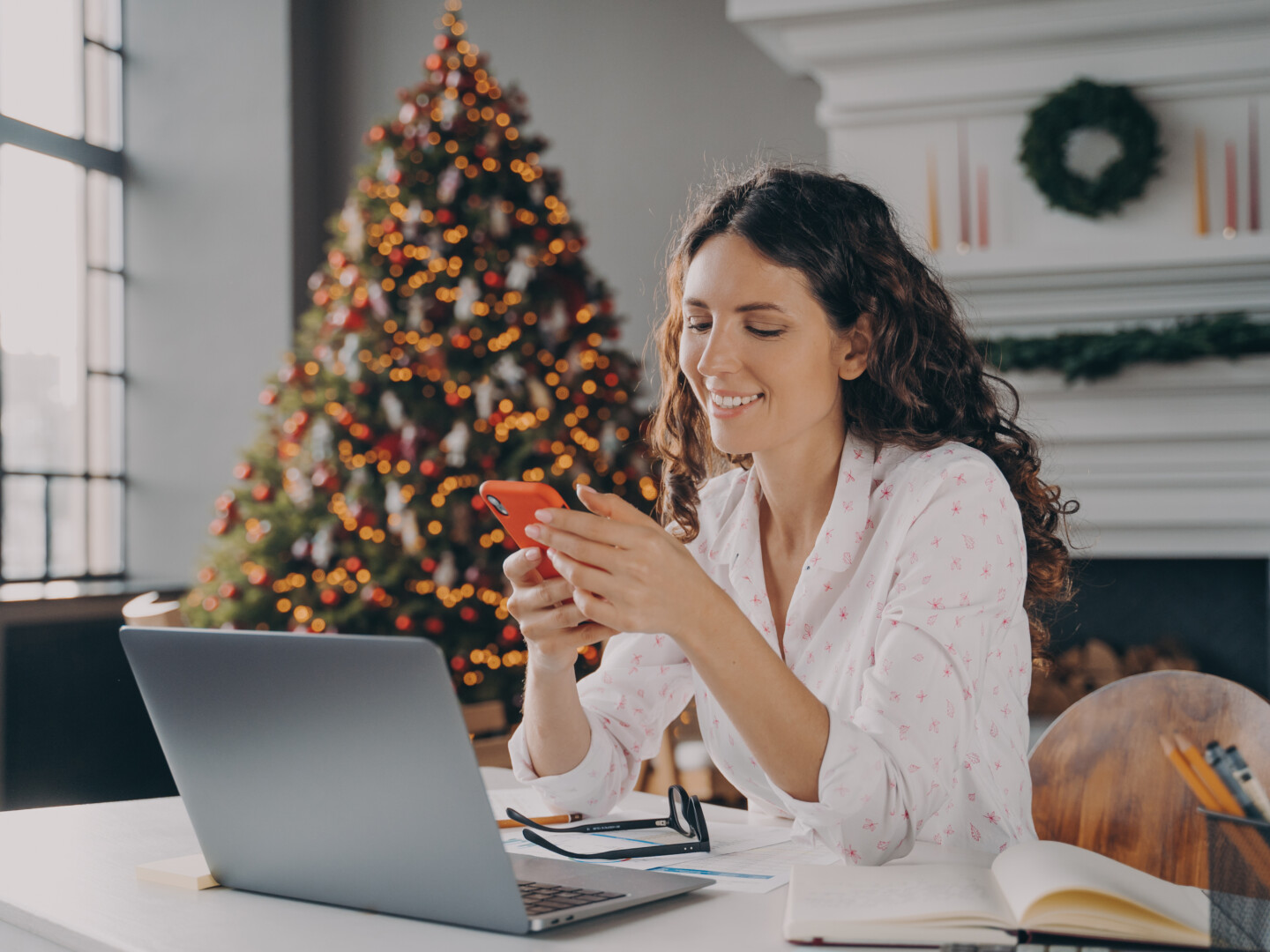 Female employee working during the festive period from home